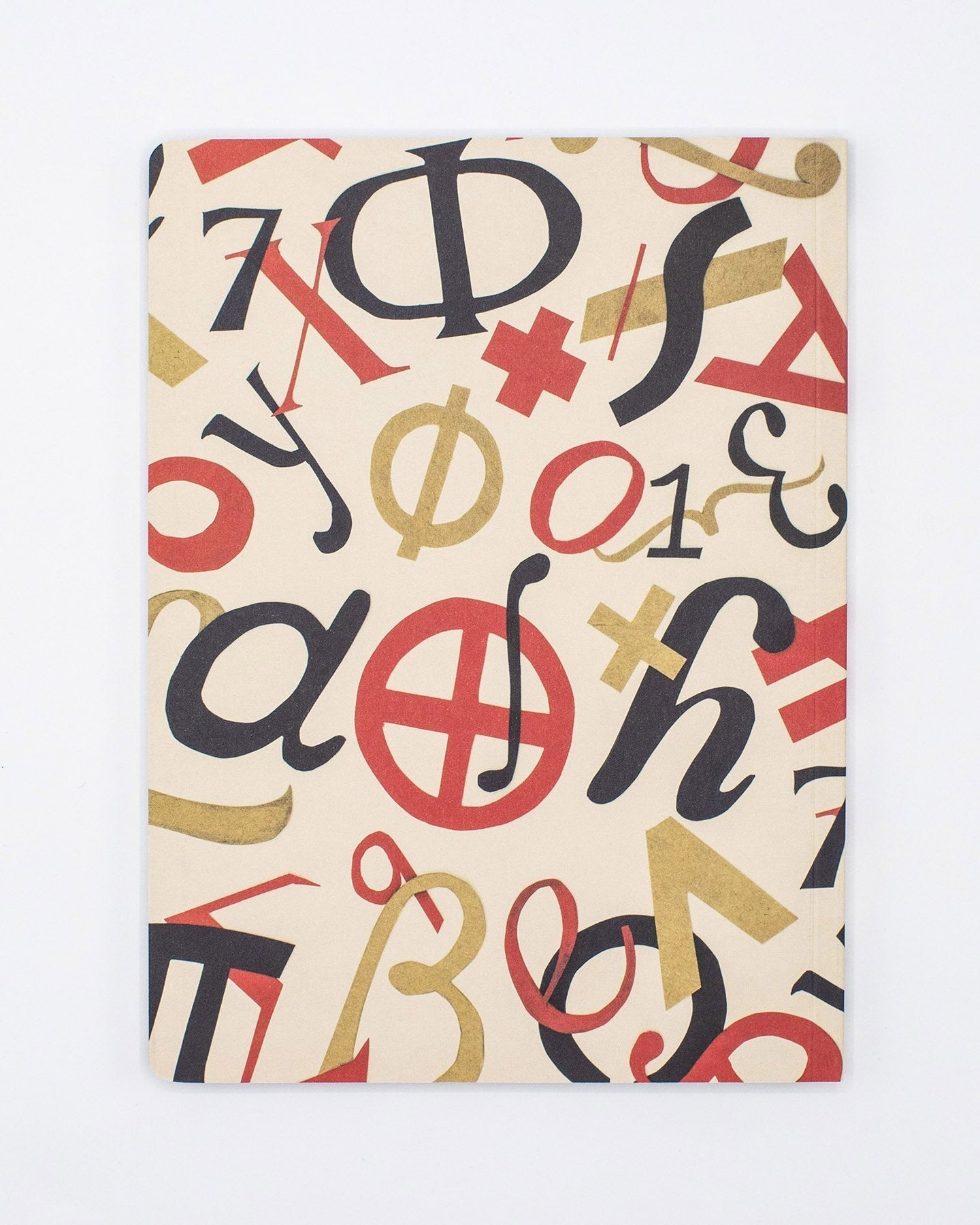 裏表紙までびっしりと記号が並ぶソフトカバーノート