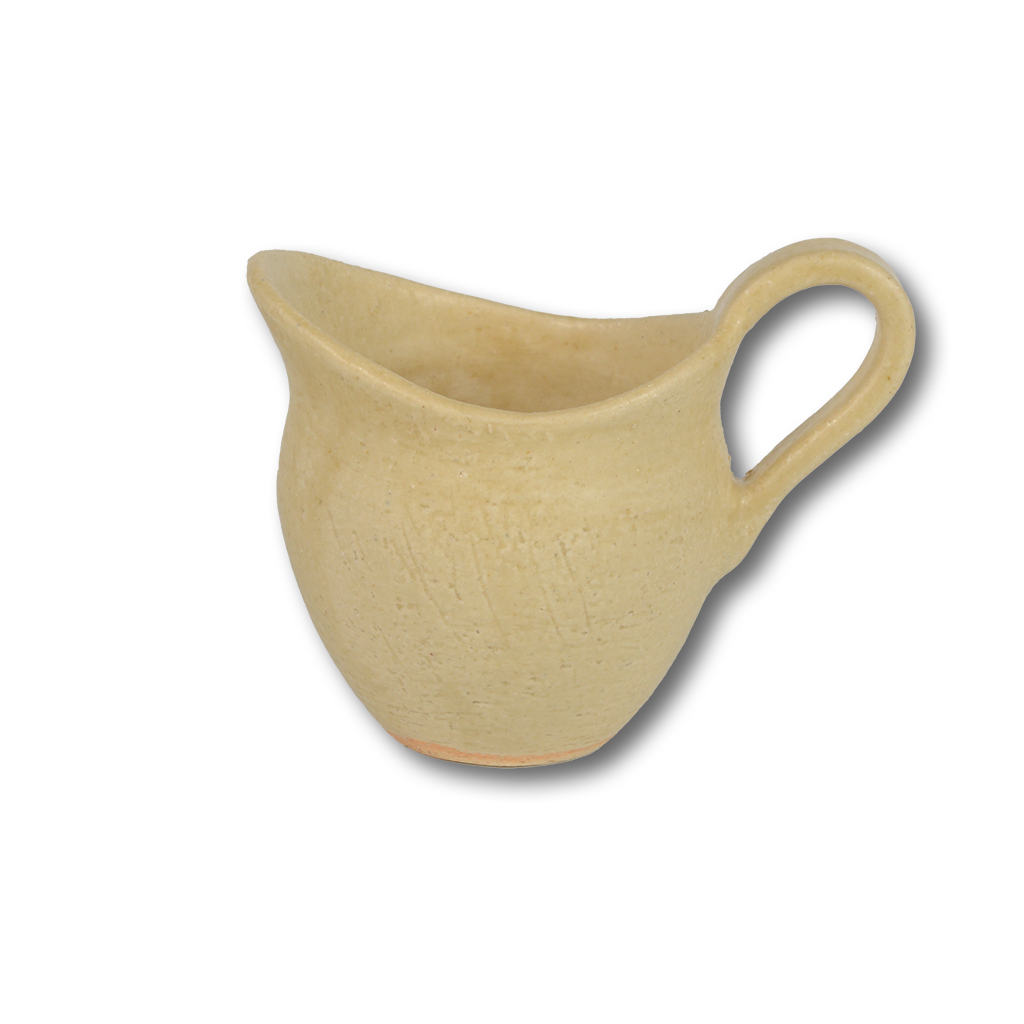 陶器作家が手がけた水差し「Photon」小サイズ。やさしい黄色のマットな質感が特徴。