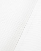 A5+サイズのハードカバーノート。LinedGridの中面。方眼と罫線の構成。スケッチと思考の整理にピッタリ